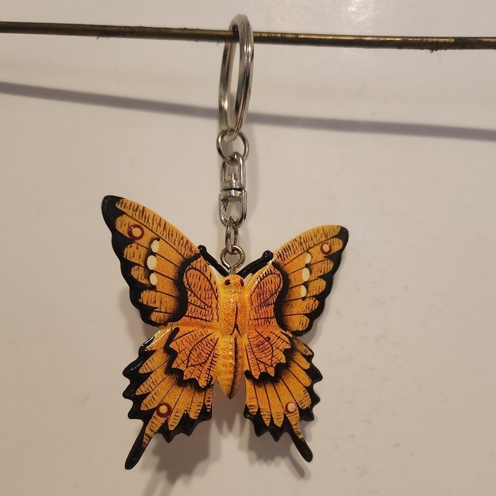 Like New butterfly key chain